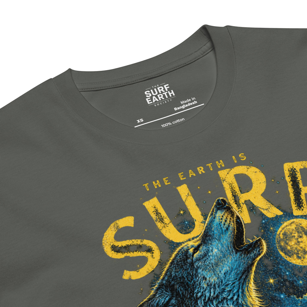 closeup of the wild THE EARTH IS SURF vintage T-shirt design featuring a howling wolf and nighttime ocean wave