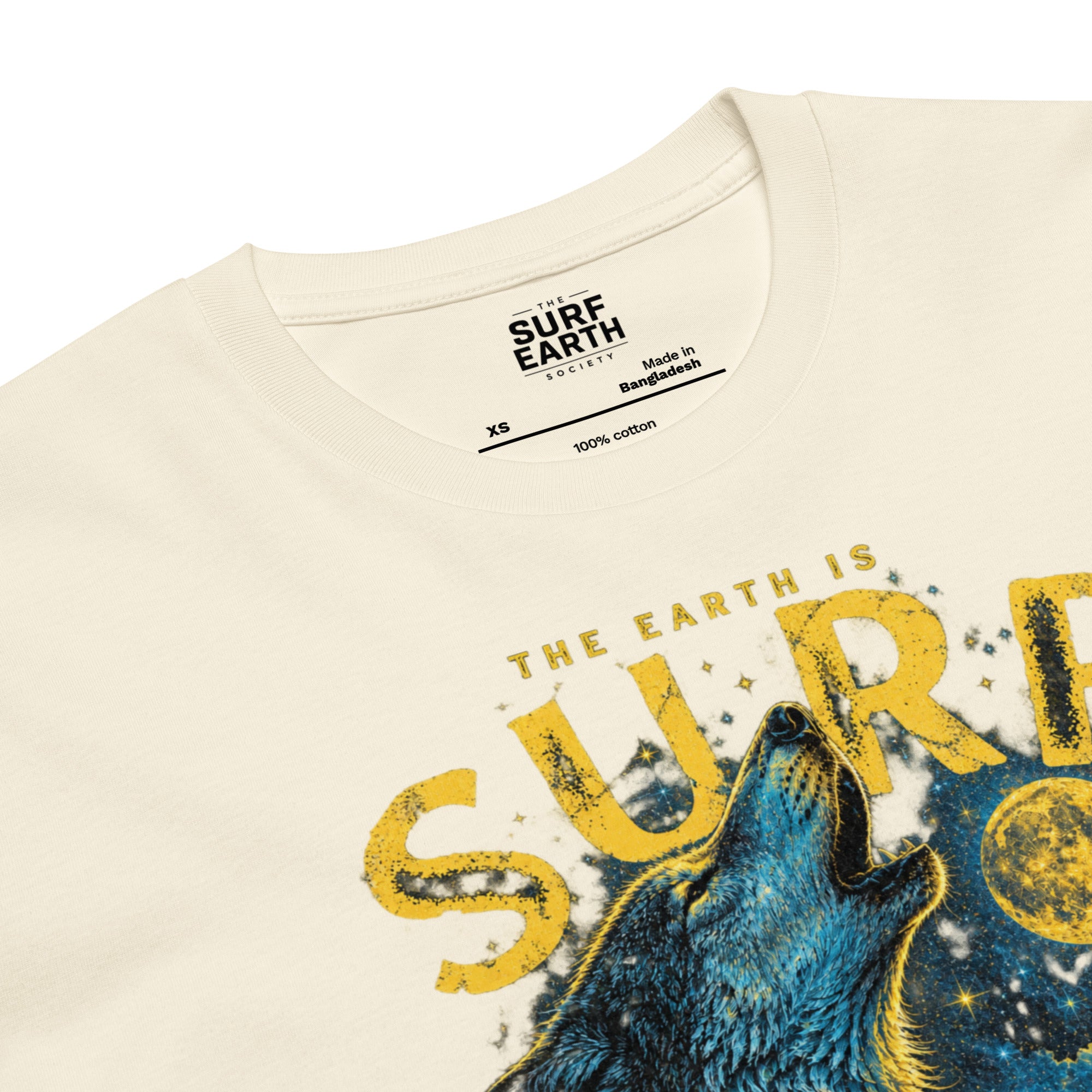 comfortable close-up cotton 90s-inspired wolf surf graphic T-shirt with a moonlit ocean, mountain landscape, and wilderness scene