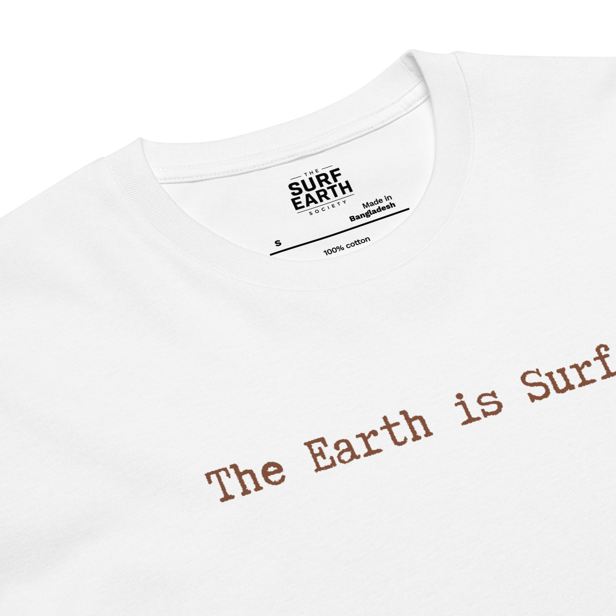Close-up of a white t-shirt with the phrase 'The Earth is Surf."