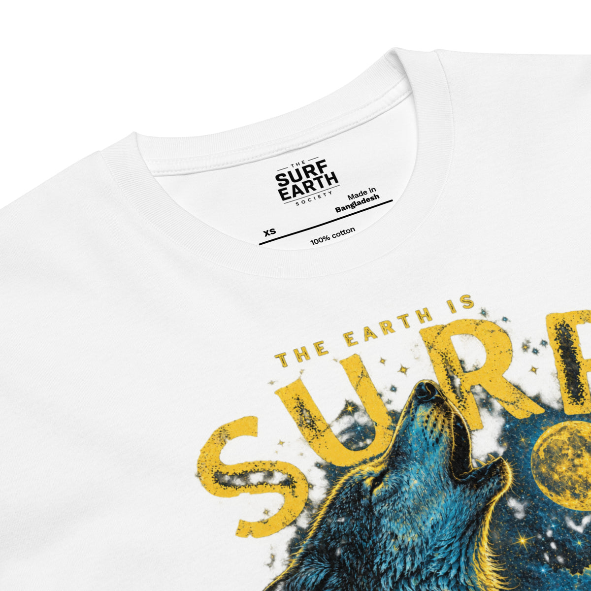 close-up look at white cotton Vintage wildlife and surfing T-shirt graphic with a wolf, full moon, stars, and perfect empty wave